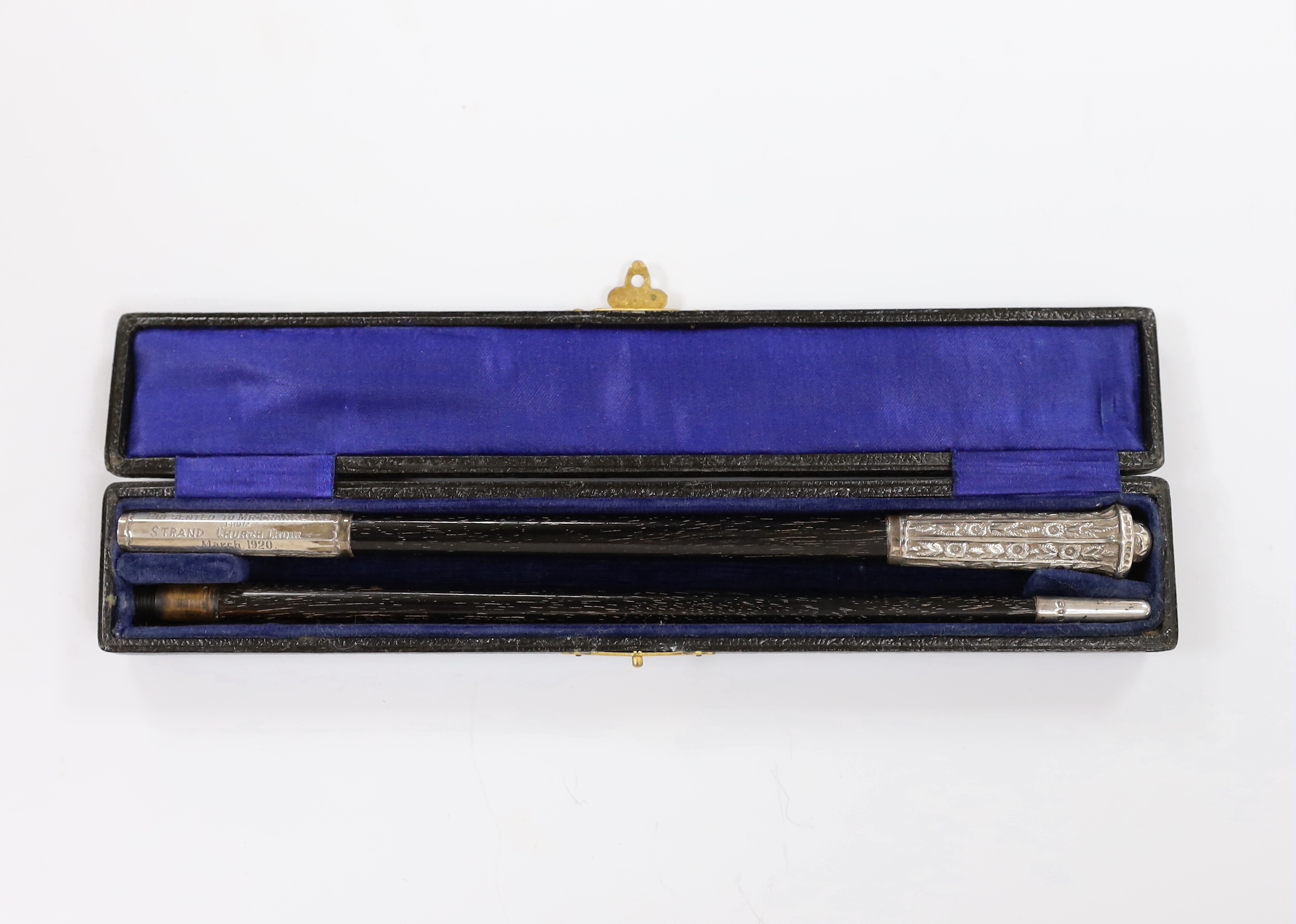 A cased George V silver mounted conductor's baton, two part baton with threaded joint, engraved dedication reading; ‘Presented to Mr. Frankland from Strand Church Choir March 1920’, hallmarked London 1919, case 24.5cm